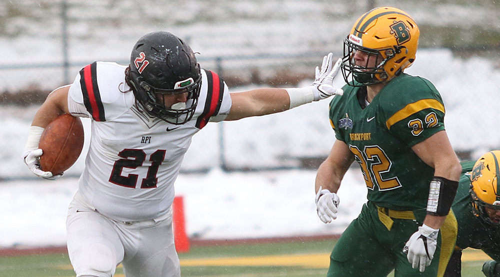 Nick Cella holds off a Brockport defense in RPI's win against the Golden Eagles in a second-round playoff game. (RPI athletics photo)