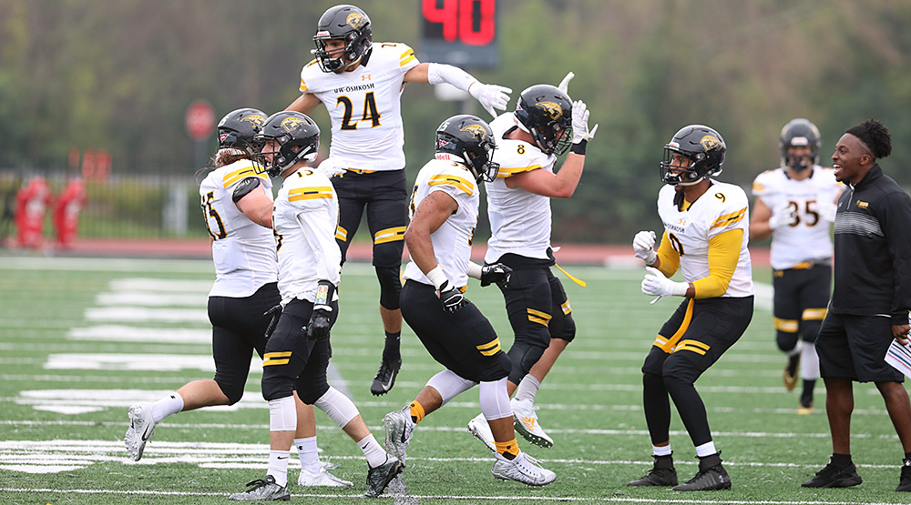 UW-Oshkosh celebrates during a season-opening victory against Carthage. (Photo by Steve Frommell, d3photography.com)