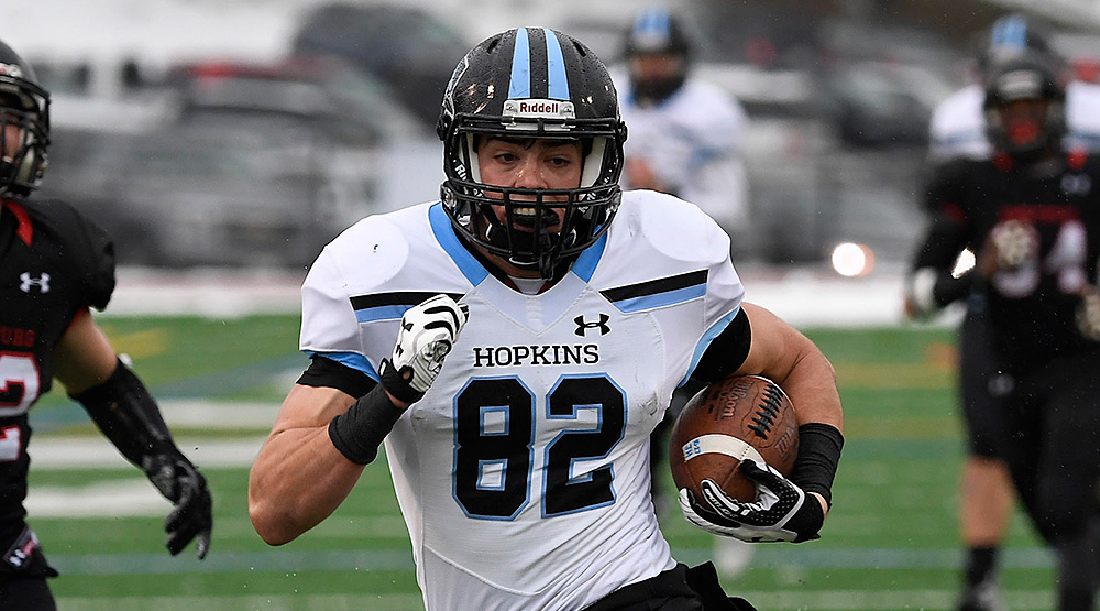 Luke McFadden running in the open field for Johns Hopkins. (Johns Hopkins athletics photo)