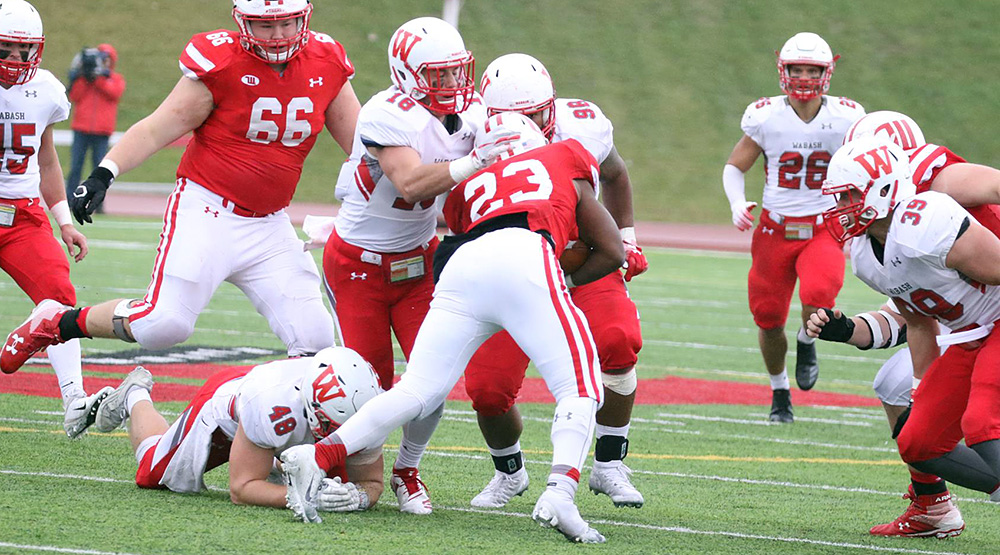 Jake Page, left, and teammate Blair Broady team up to stop a Wittenberg ballcarrier. (Wabash athletics photo)